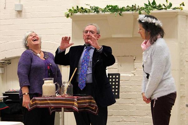 Peter Wentworth performing a magic trick at WI Christmas dinner.jpg